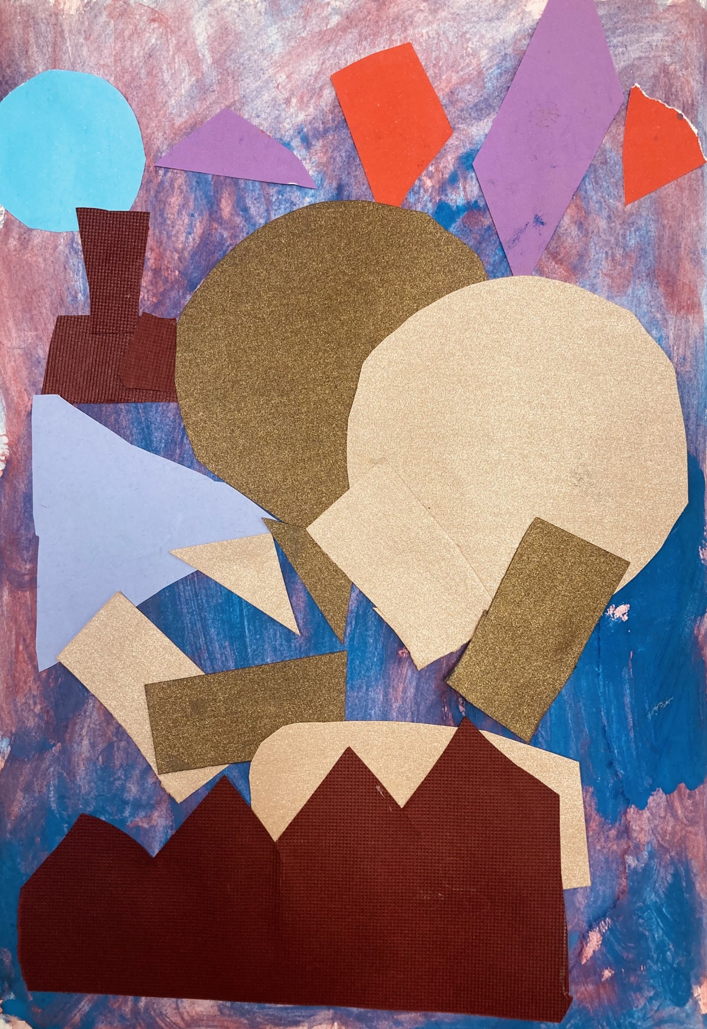 A collage of colorful paper shapes on a blue and purple textured background. The art project appears to be part of a colour mixing and shade experimentation.